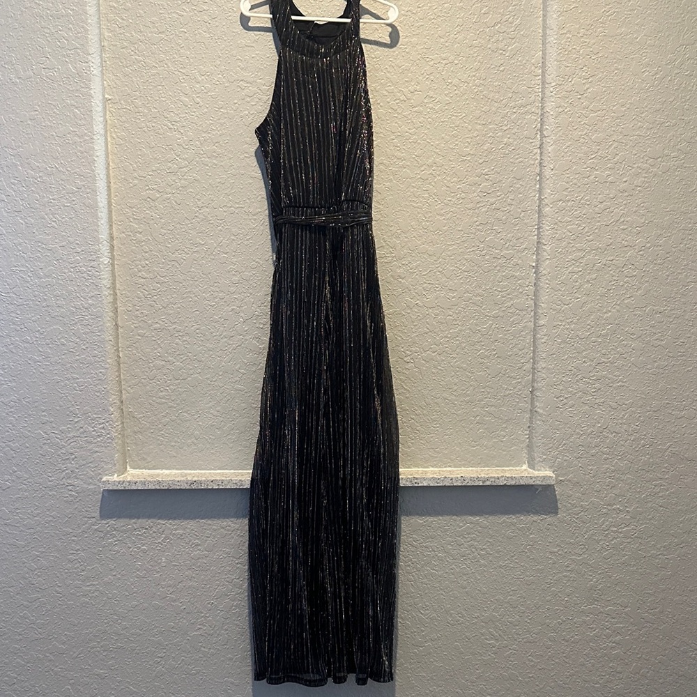 Girls Black jumpsuit with metallic detail and open bow back. - super cute style!